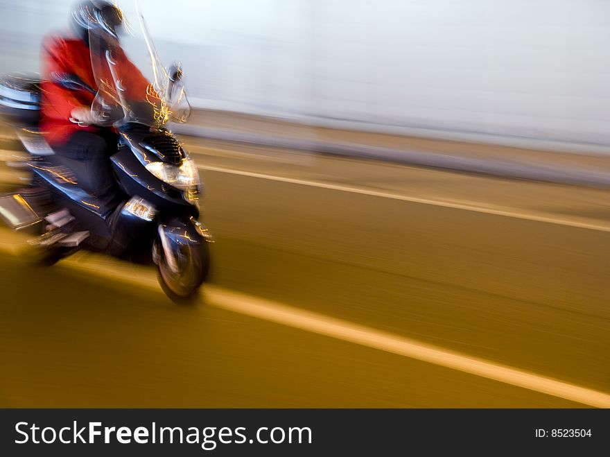 Biker rides for tunnel at high speed