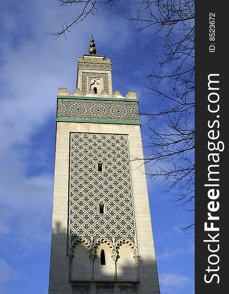 Tower building in mosque, blue sky and ancient building