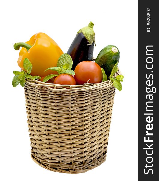 Basket with pepper, eggplant and tomatoes. Basket with pepper, eggplant and tomatoes