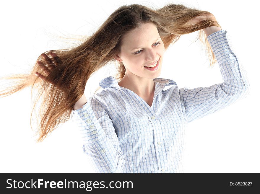 Windswept Exhilaration of young woman with long hair isolated on white background