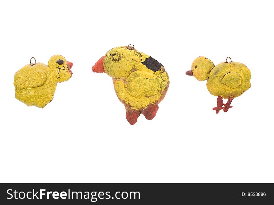 Trhee ducks made with clay on white background