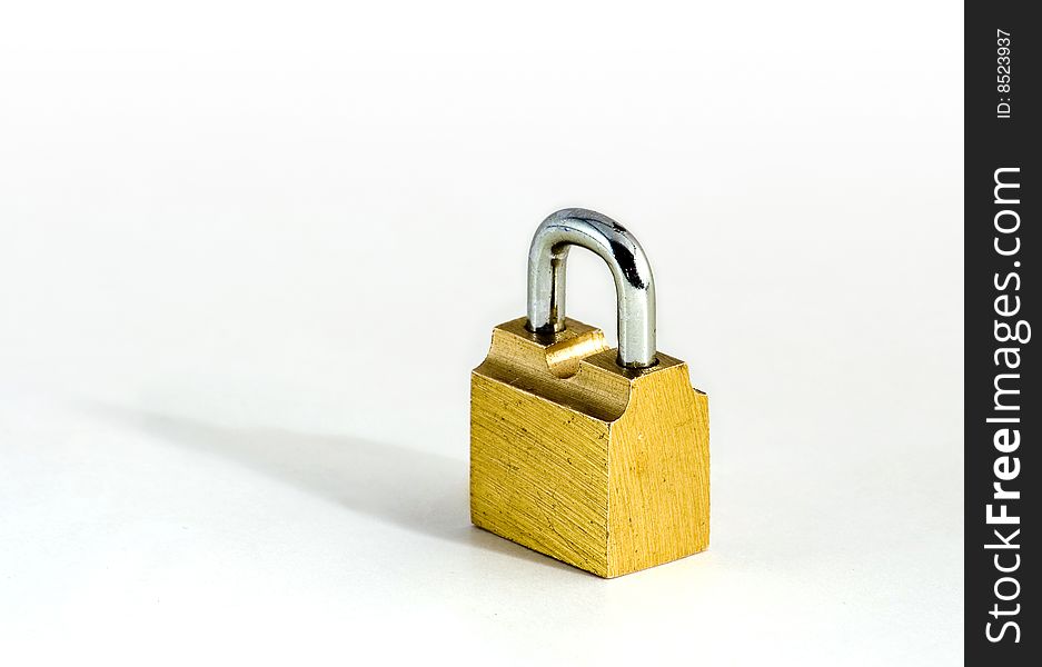 Key and lock of the wanted colour on white background