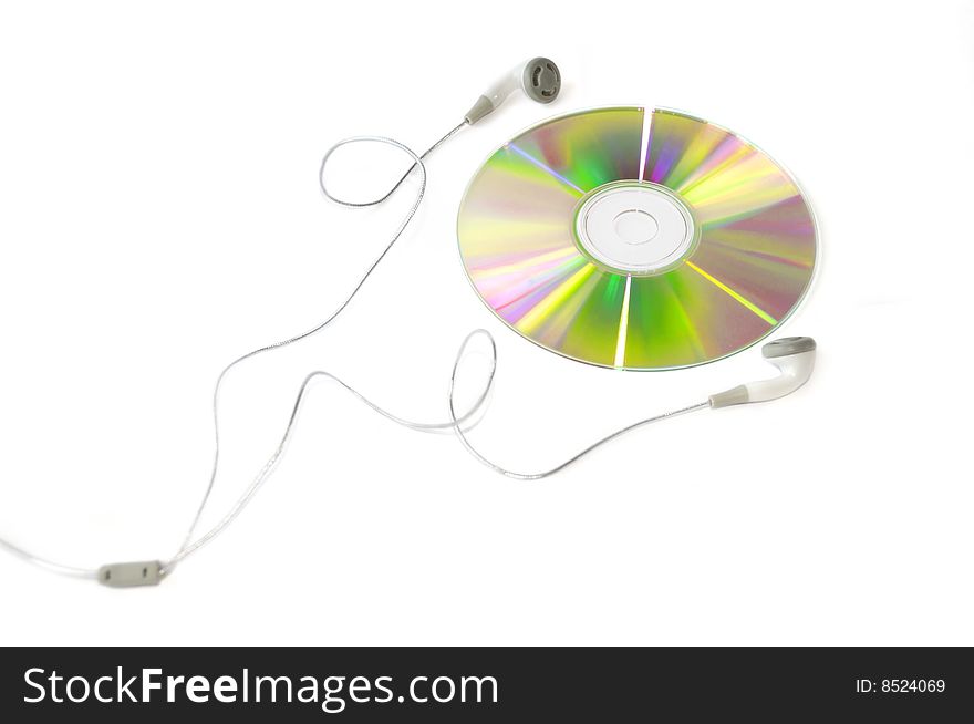 A compact disc and headphones isolated on white background. A compact disc and headphones isolated on white background