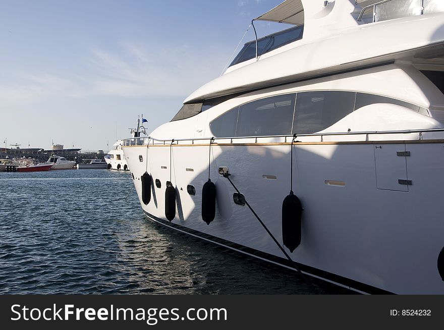 Side view of a majestic, luxurious yacht in Dubai Marina, during boat show. Side view of a majestic, luxurious yacht in Dubai Marina, during boat show.
