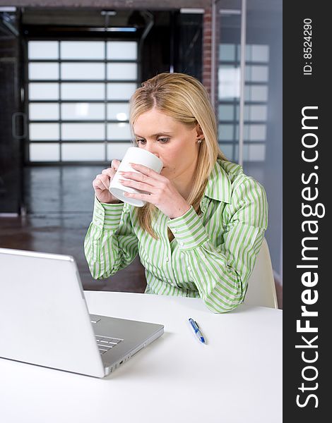 Business woman at her desk in a modern office