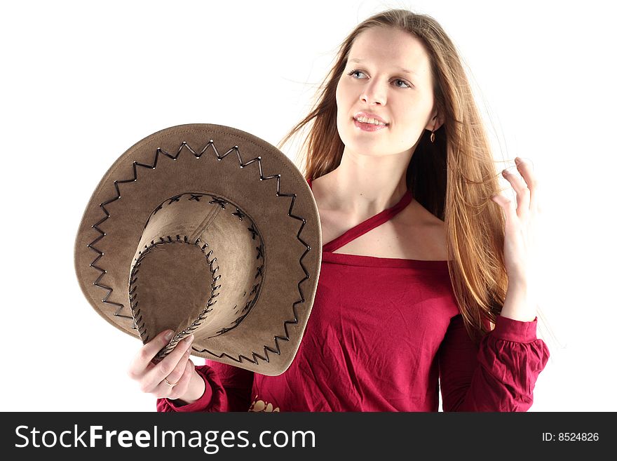Portrait of young woman in cowboy hat with long hair isolated on white background