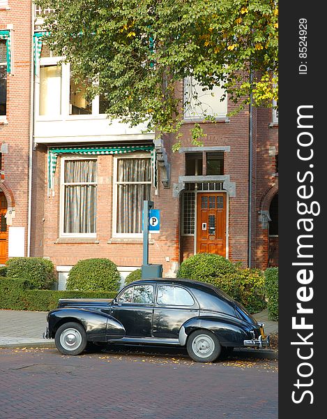 Old car in the street of Amsterdam