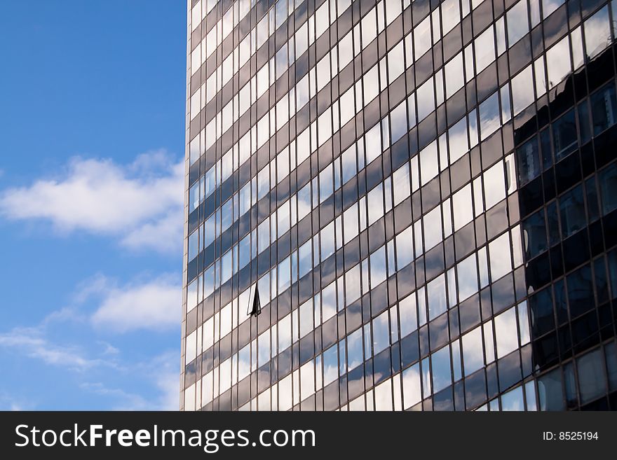 Reflections of sky in an office building. Reflections of sky in an office building