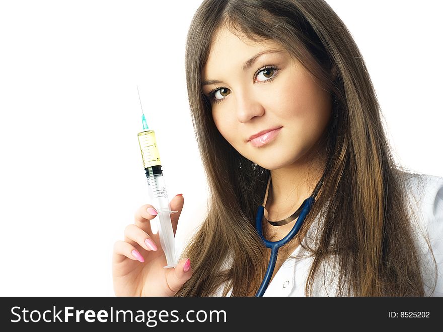 Beautiful young doctor is ready to give an injection, against white background. Beautiful young doctor is ready to give an injection, against white background