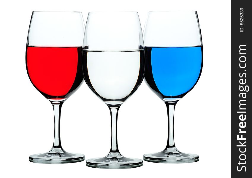 Three coloured wine glasses isolated on white