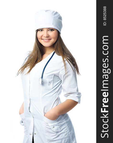 Portrait of a beautiful young doctor wearing white uniform with a stethoscope. Portrait of a beautiful young doctor wearing white uniform with a stethoscope