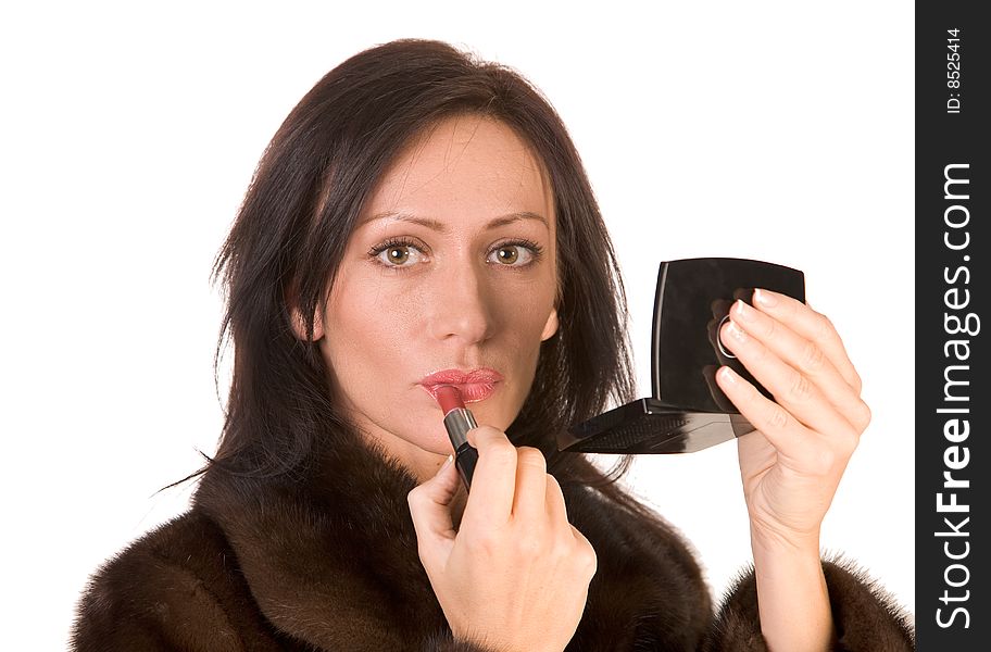 Beautiful Woman Applying Red Lipstick