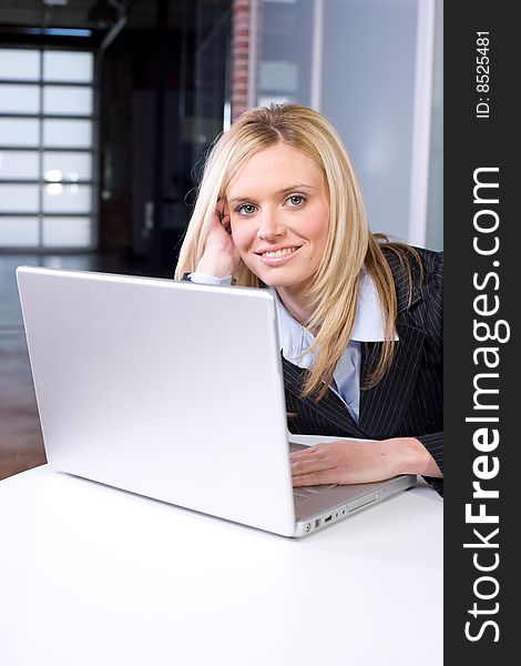 Business woman at her desk in a modern office