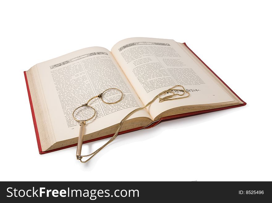Vintage book and pince-nez. Isolated on white. Path included