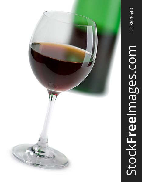 Bottle and glass of red wine on a white background