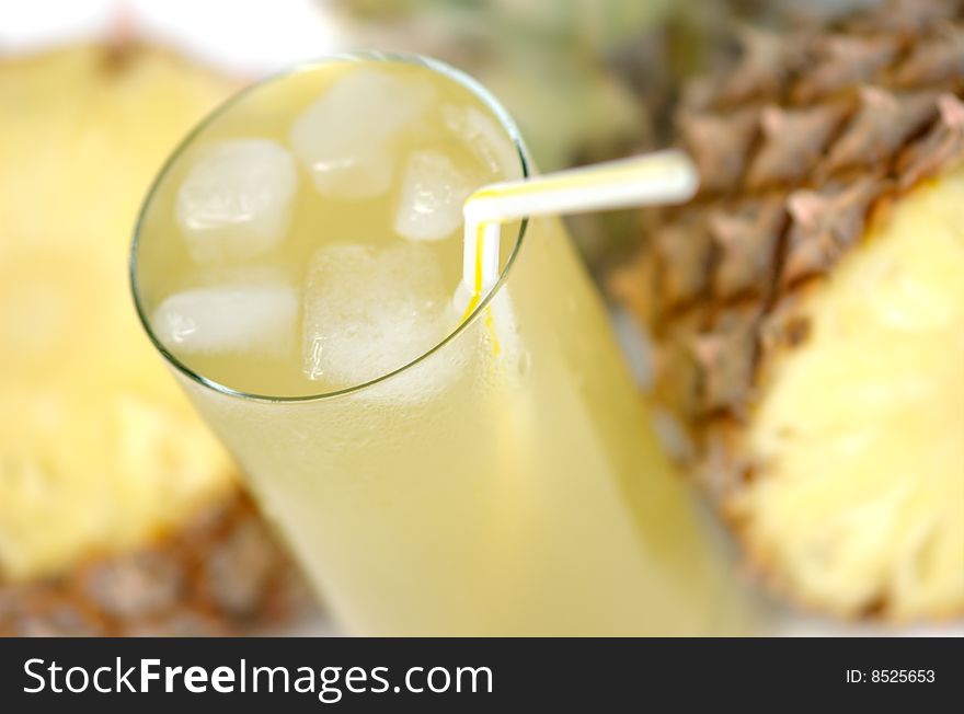 Pineapple and juice of pineapple with an ice