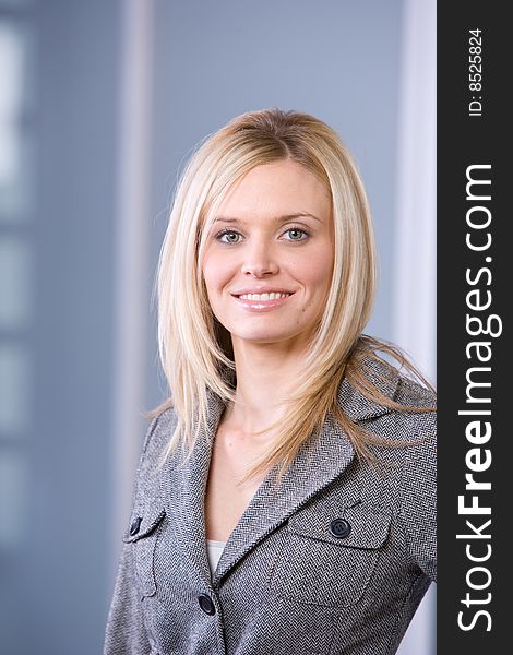 Business woman portrait in a modern office