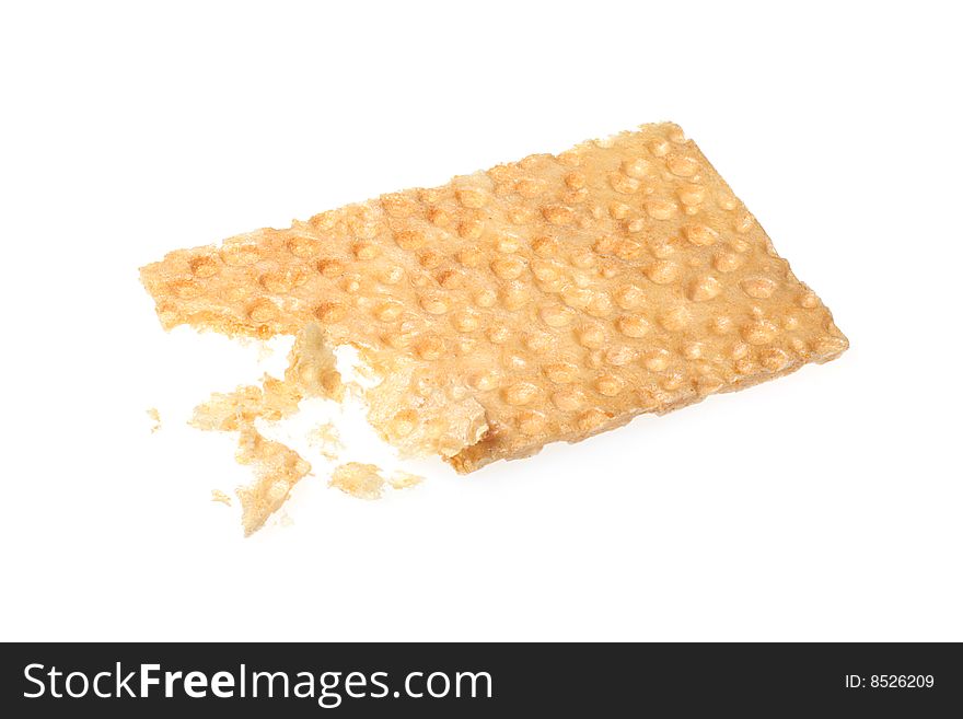 Bitten crispbread on a white background