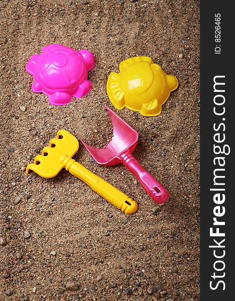 Kids' sand colored toys shovel and forms. Kids' sand colored toys shovel and forms