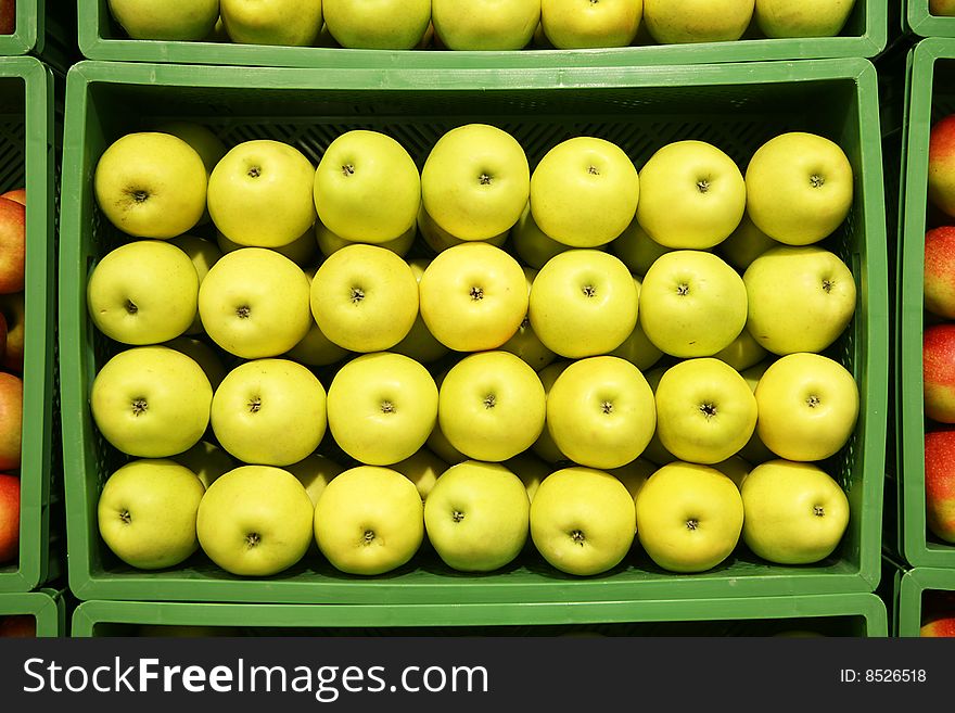 Green apples in the box