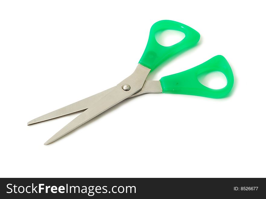 Scissors with green grip isolated on white. Scissors with green grip isolated on white