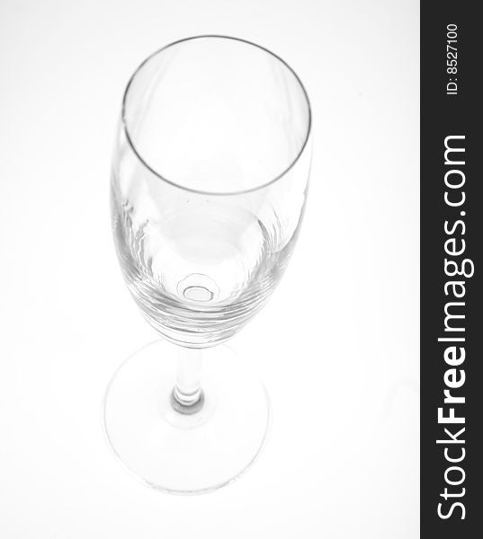 An empty wine glass isolated on white background. An empty wine glass isolated on white background