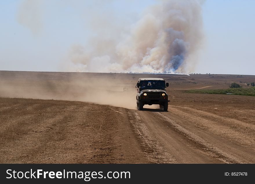 Military Car Escape From Fire