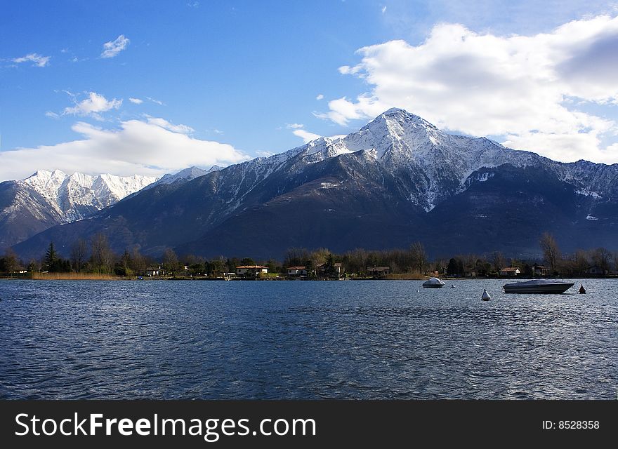 Lake surrounded by snow-capped mountains. Lake surrounded by snow-capped mountains
