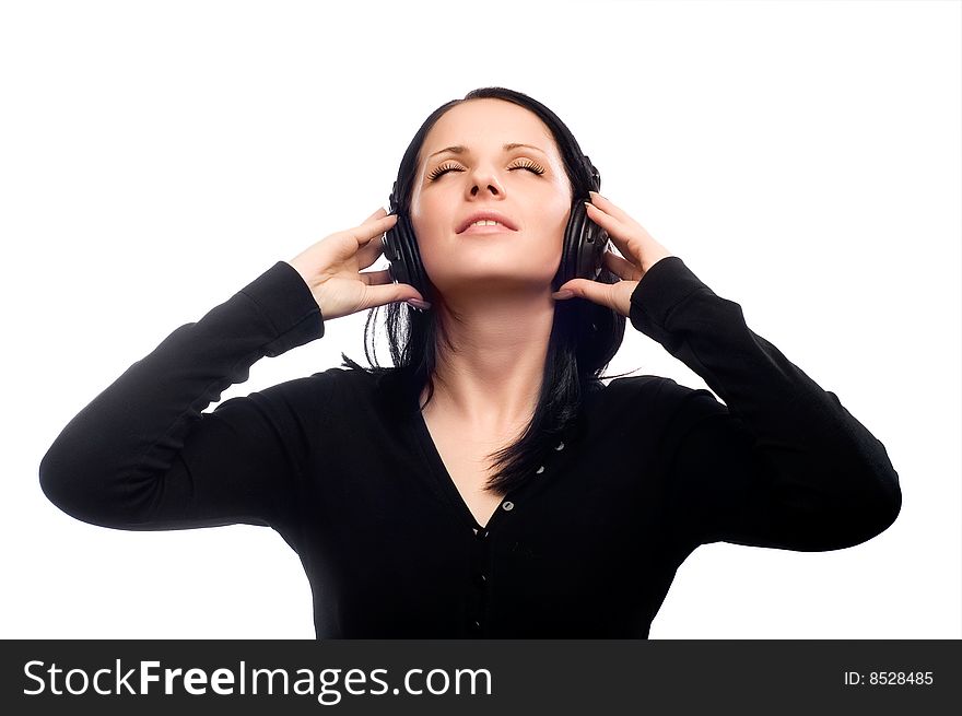 Beautiful young girl dancing in the headphones. Beautiful young girl dancing in the headphones