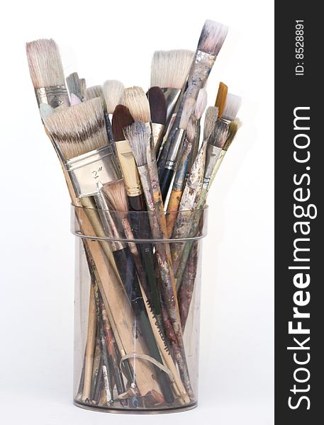 Used artist s brushes in a pot