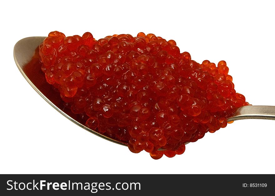 Red caviar on a spoon isolated over white background. Clipping path. Red caviar on a spoon isolated over white background. Clipping path.