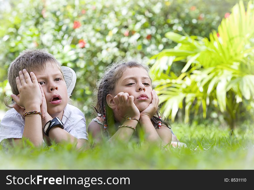 Portrait of little kids having good time in summer environment. Portrait of little kids having good time in summer environment