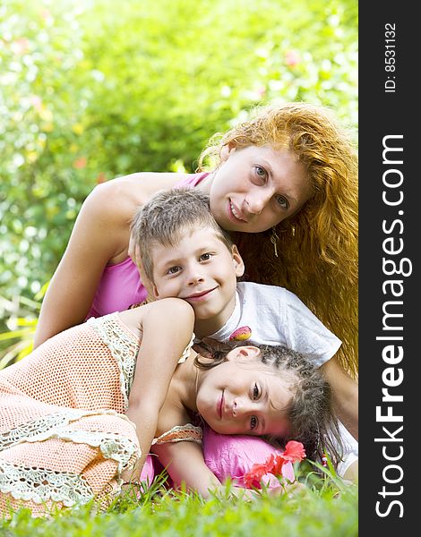 Portrait of little kids with mama  having good time in summer environment. Portrait of little kids with mama  having good time in summer environment