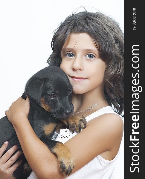 Portrait of little girl having good time with her puppy. Portrait of little girl having good time with her puppy