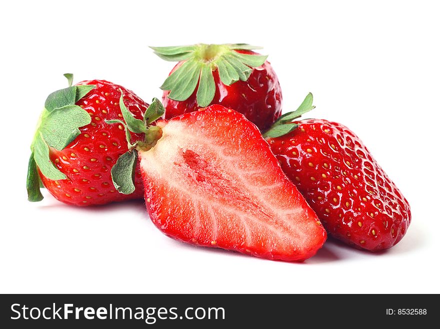 Fresh strawberries isolated on white background - close up