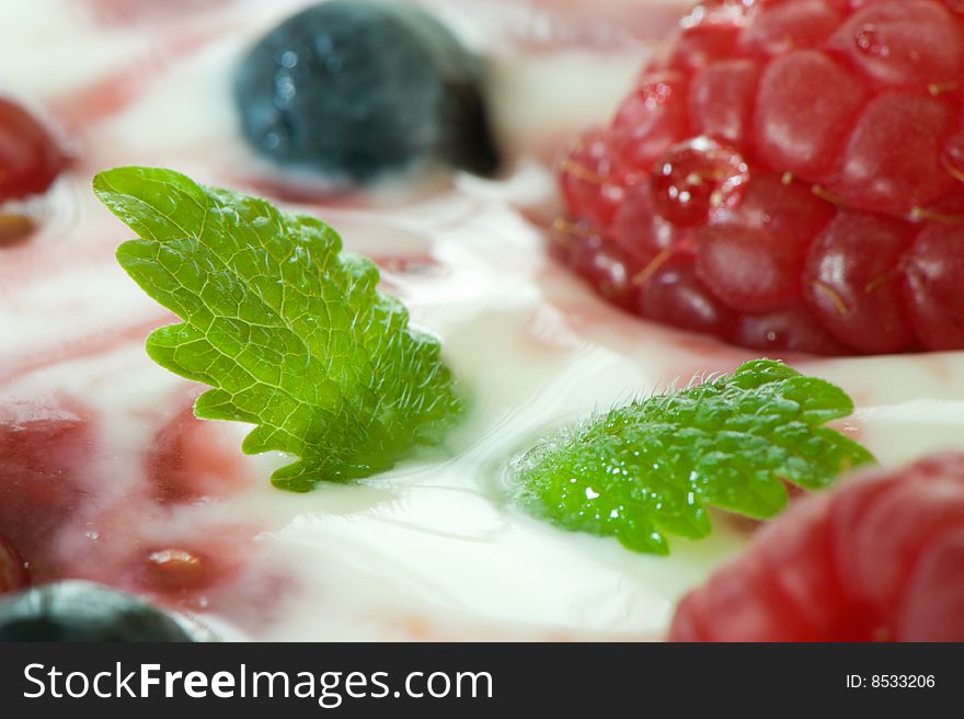 Macro image of berry fruit in yogurt. Food for a healthy lifestyle. health background.