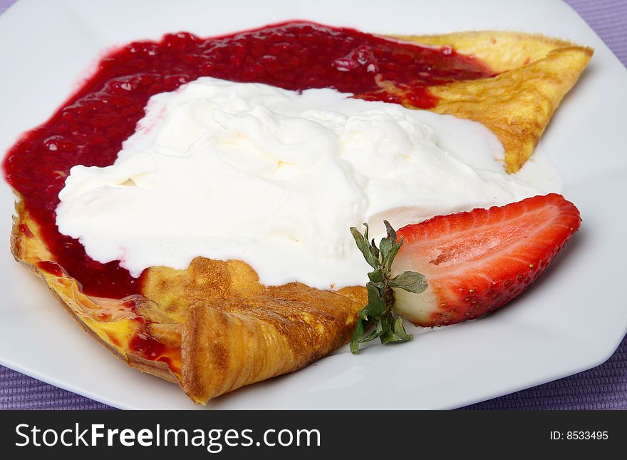 Pancake with fruit and cream