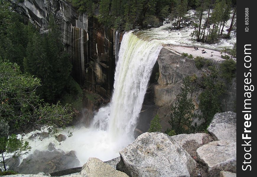 Vernal Falls, please note the specks to the right of the waterfall are people. It puts the size of the picture into perspective. Vernal Falls, please note the specks to the right of the waterfall are people. It puts the size of the picture into perspective.