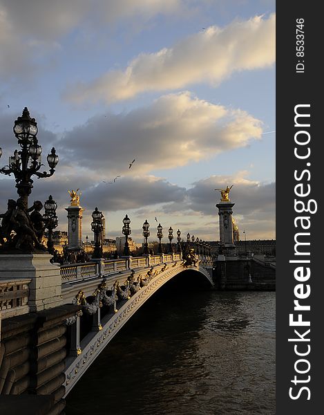 Bridge on seine river, sunset with cloudy sky. Bridge on seine river, sunset with cloudy sky