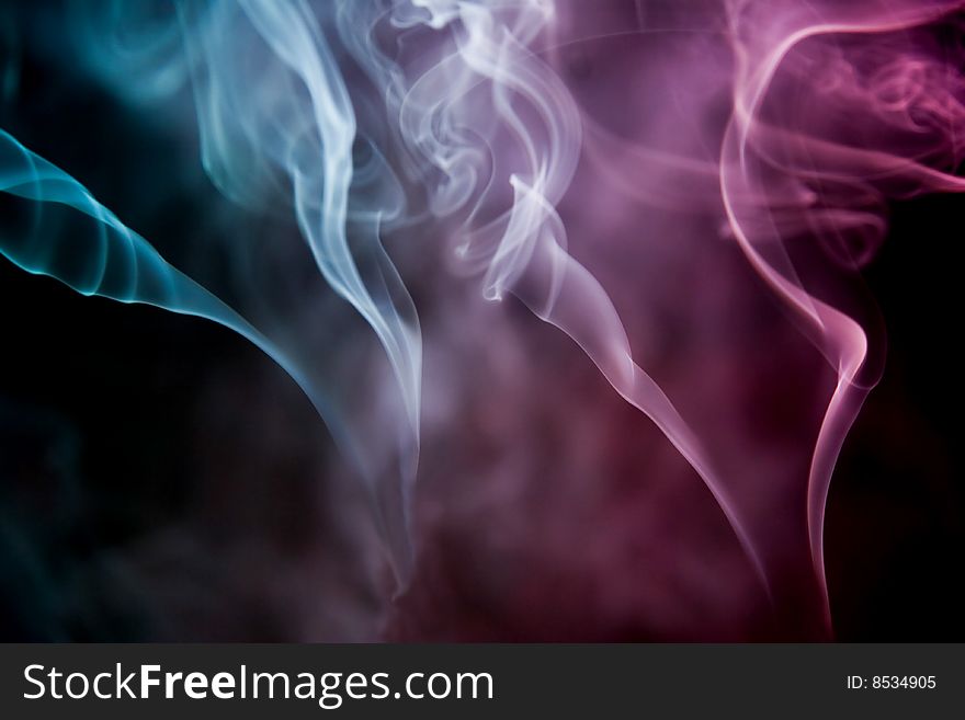 Smoke illuminated by two light sources on a black background, Computer processing. Smoke illuminated by two light sources on a black background, Computer processing