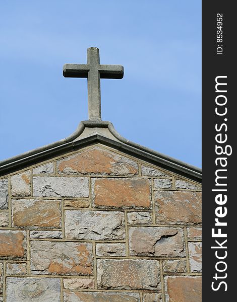 A cross on top of a church building