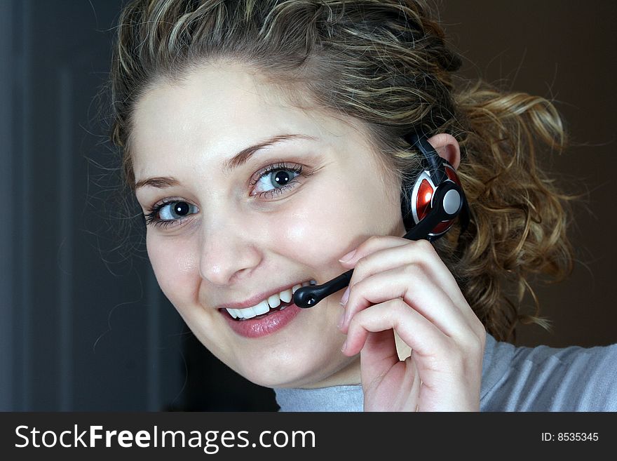 Girl taking calls in office. Girl taking calls in office