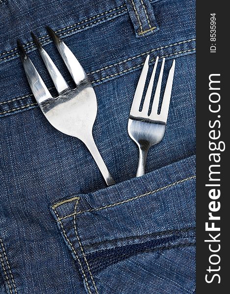 Background jeans with kitchen utensil