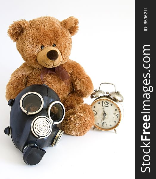 The Nursery toy, gas mask, old watch on white background. The Nursery toy, gas mask, old watch on white background.