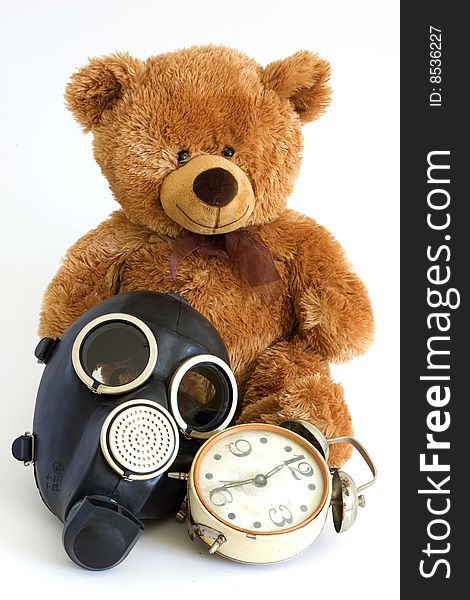 The Nursery toy, gas mask, old watch on white background. The Nursery toy, gas mask, old watch on white background.