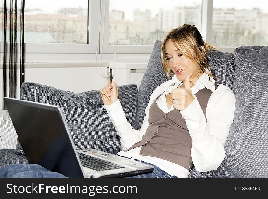 Beautiful businesswoman working at home