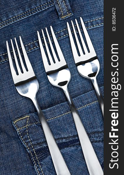 Background jeans with kitchen utensil