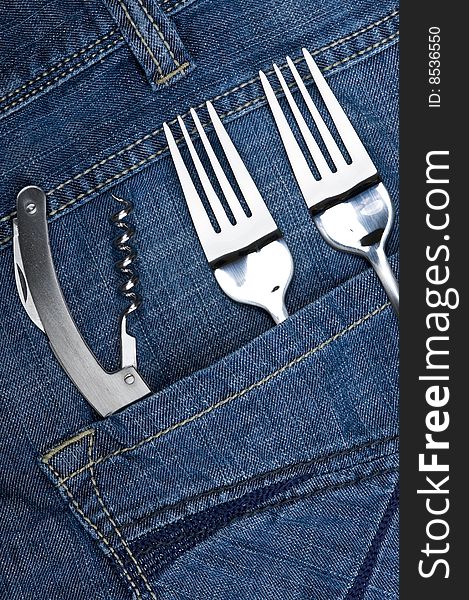 Background jeans with kitchen utensil