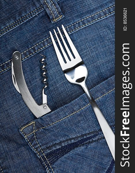 Background jeans with kitchen utensil