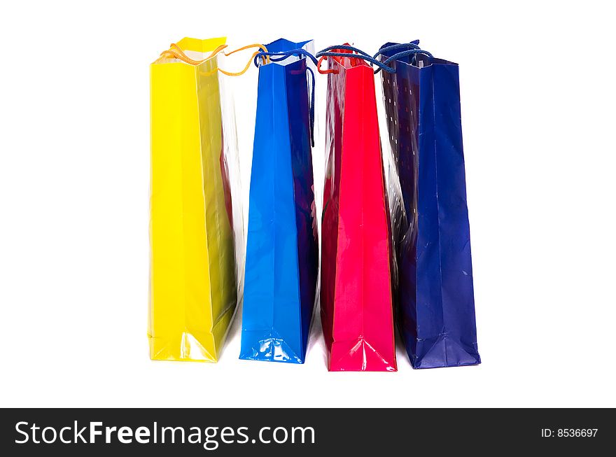 Colour paper bags on white background